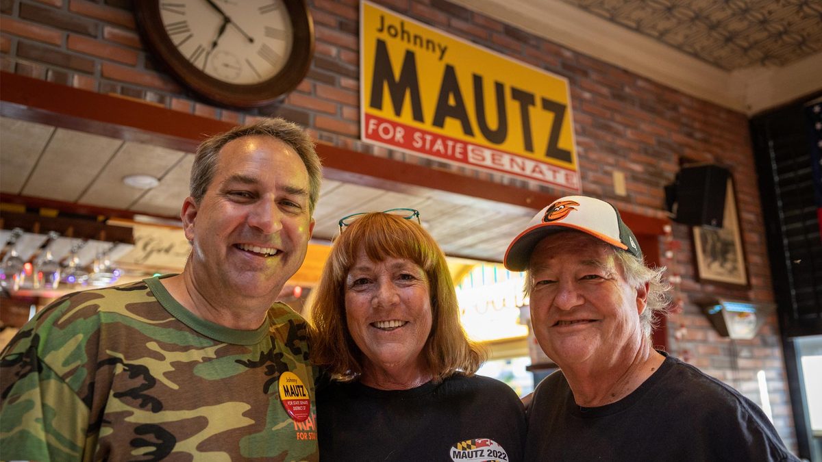 State Senator Johnny Mautz with neighbors at Carpenter Street Saloon